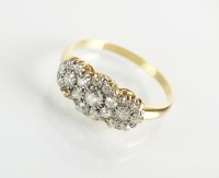 Lot 126 - A diamond set floral cluster ring, designed as...