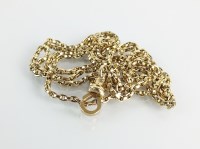 Lot 136 - A yellow metal chain necklace, with attached...