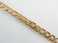 Lot 148 - A 9ct gold diamond set bracelet, designed as...