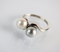 Lot 150 - A Boodles platinum cultured pearl crossover...