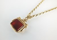 Lot 154 - A 9ct gold mounted Carnelian swivel fob,...