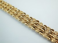 Lot 161 - A yellow metal floral link bracelet, with box...