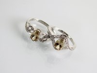 Lot 168 - An 18ct white gold zultanite and diamond...