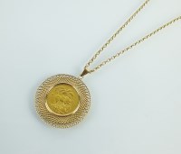 Lot 172 - A sovereign pendant, dated 1892, within yellow...