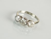 Lot 185 - A three stone graduated old cut diamond ring,...