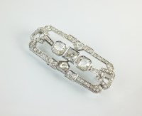 Lot 205 - An Art Deco style diamond brooch, designed as...