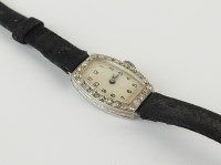 Lot 213 - A Lady's diamond set wristwatch, the white...