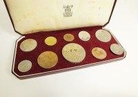 Lot 440 - A collection of British and foreign, silver,...