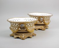 Lot 17 - A pair of Copeland porcelain pierced baskets,...