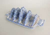 Lot 27 - A blue and white earthenware toast rack, 19th...