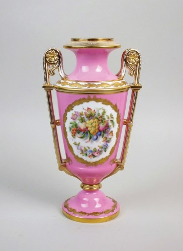 Lot 37 - A Coalport porcelain pink ground two handled...