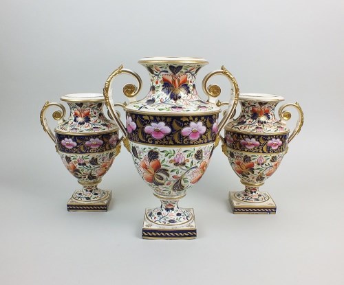 Lot 41 - A garniture of three Derby porcelain vases,...