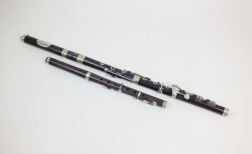 Lot 110 - A rosewood cased flute by J. Wallis, 135...