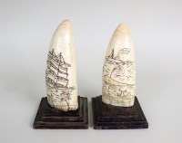 Lot 117 - A pair of whale tooth scrimshaw late...