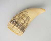 Lot 118 - A scrimshaw whale tooth 19th century of a ship,...