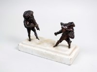 Lot 125 - A French bronze group of fighting dwarves,...