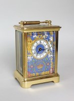 Lot 138 - A Halcyon Days enamels carriage time piece,...