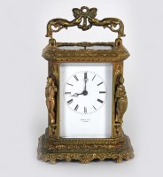 Lot 150 - A French cast gilt brass carriage clock with...