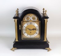 Lot 161 - An Edwardian ebony cased bracket clock, in...