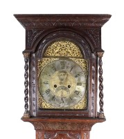 Lot 164 - A George III oak longcase clock, later carved,...