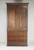 Lot 190 - A mahogany linen press, early 19th century,...