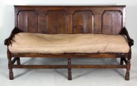 Lot 193 - An oak coaching settle, first half 18th...