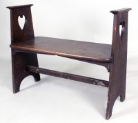 Lot 194 - An oak hall bench, circa 1905, in the manner...