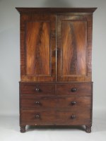 Lot 195 - A George IV mahogany linen press, circa 1830,...