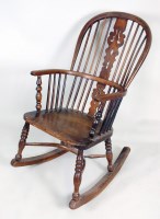 Lot 199 - A beech and elm kitchen Windsor rocking chair,...