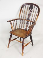 Lot 201 - A high back ash and elm Windsor arm chair,...