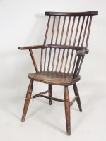 Lot 202 - An ash and elm comb back Windsor chair,...