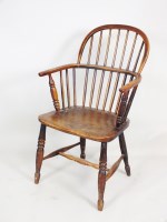 Lot 203 - An ash and elm low Windsor armchair, the low...