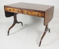 Lot 207 - A Regency cross banded mahogany sofa table,...