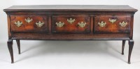 Lot 214 - A George III oak dresser base, late 18th...