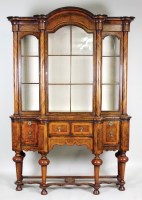 Lot 218 - A Dutch walnut and inlaid breakfront display...