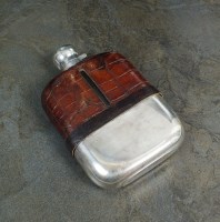 Lot 58 - A silver and leather mounted hip flask, James...