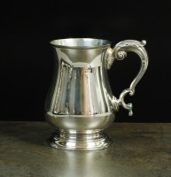 Lot 75 - A silver mug, Olivant & Botsford, London 1957,...