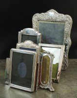 Lot 90 - A collection of six silver mounted photograph...