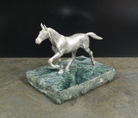 Lot 92 - A silver plated model of a horse,...