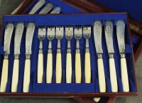 Lot 93 - A Victorian cased set of silver fish knives...