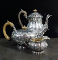 Lot 133 - A George IV part three piece silver part tea...