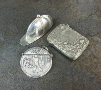 Lot 144 - A continental silver 'golfing' vesta case,...