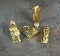 Lot 155 - A collection of four novelty brass vesta cases,...