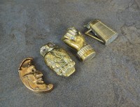 Lot 156 - A collection of four novelty brass vesta cases,...