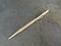 Lot 161 - A 9ct gold retractable pencil, E Baker & Son,...