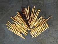 Lot 163 - A large collection of turned wood lace bobbins,...