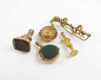 Lot 177 - A smoky quartz set seal fob, with engraved...