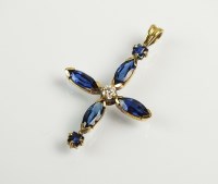 Lot 188 - A sapphire and diamond crucifix pendant,...