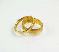 Lot 205 - Two 22ct gold wedding bands, total weight 7.7g...