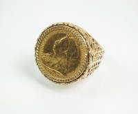 Lot 217 - A half sovereign ring, dated 1900, mounted to...